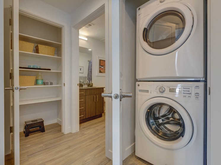 Front load washer/dryer in laundry area and closet
